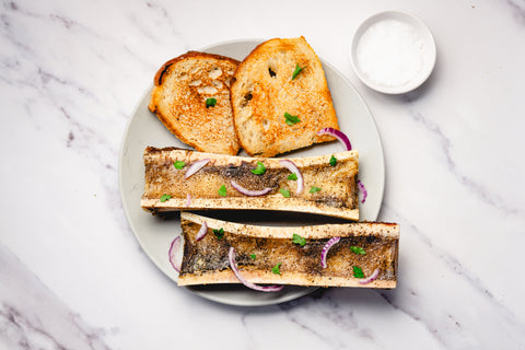 Bone Marrow Boats with Sourdough Toast and Red Onion Salad