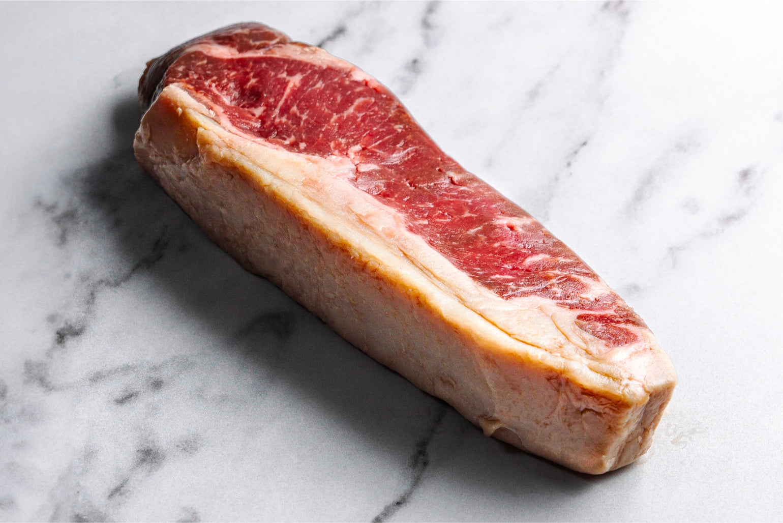 The Difference Between A Ribeye Steak and a Sirloin Steak. That Fat Cow